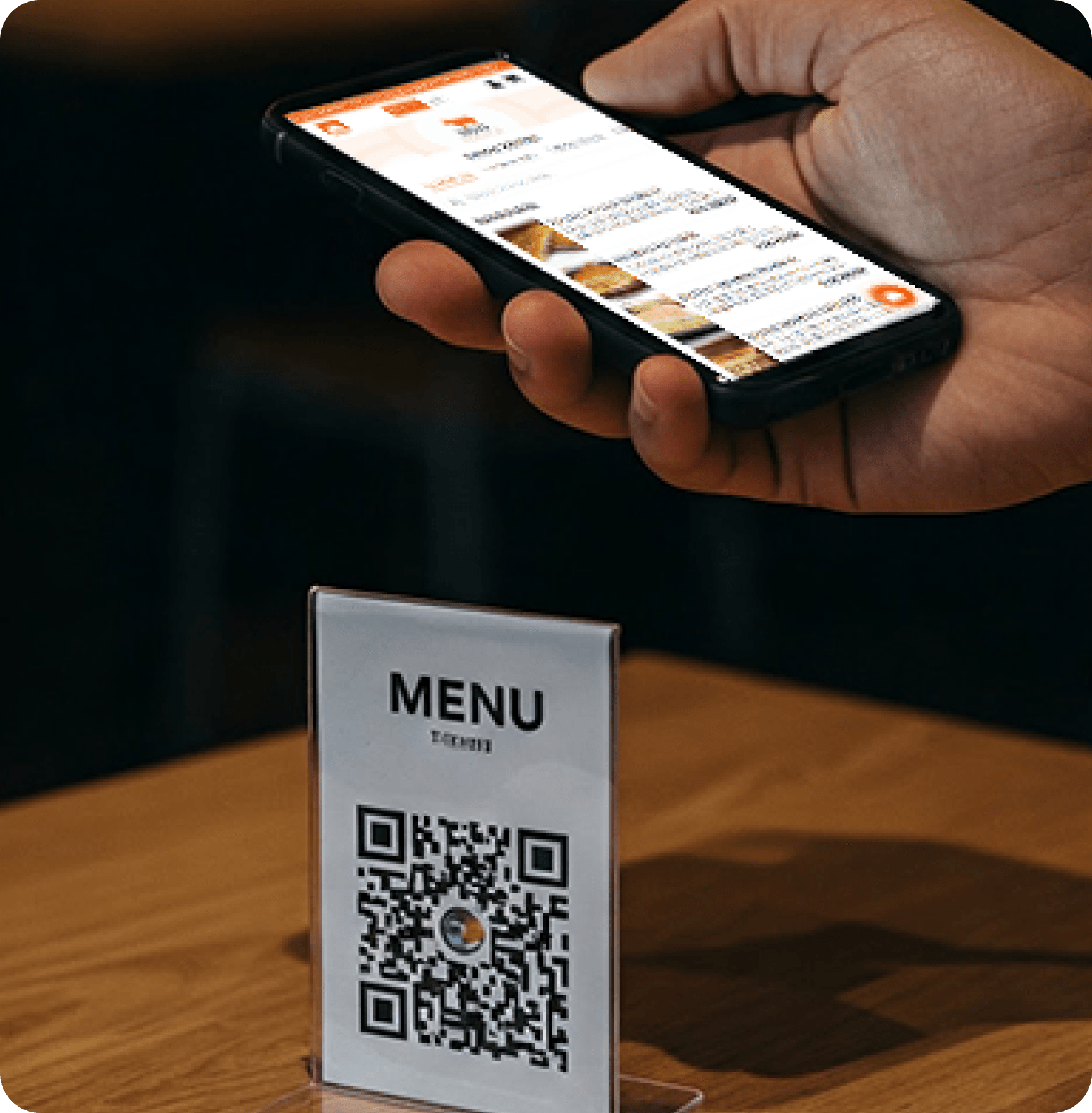 Guest scanning a Restaurant OS menu QR code at their table