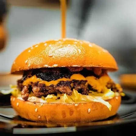 Burger being finished at The Burger Company